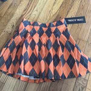 Tricks n treatz ghouls go first argyle mini skirt
